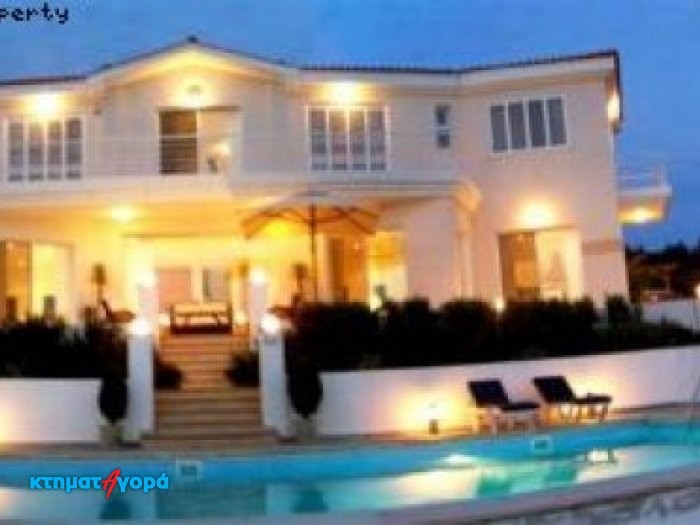 https://www.ktimatagora.com/media/property-images/63150-a-four-bedroom-luxury-villa-with-stunning-views-in-agios-georgios_full.jpg